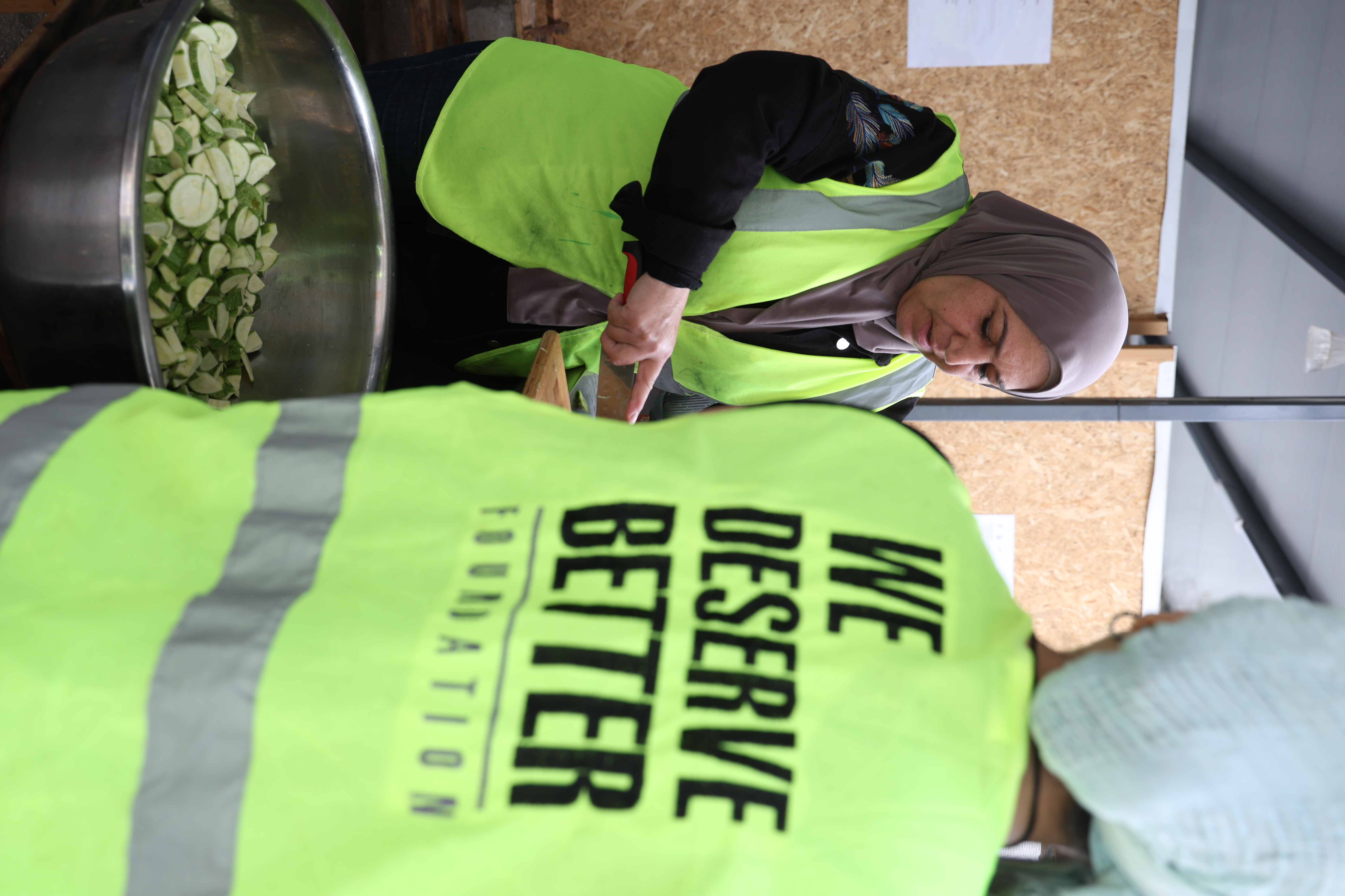 WDBF volunteer preparing food in the kitchen
